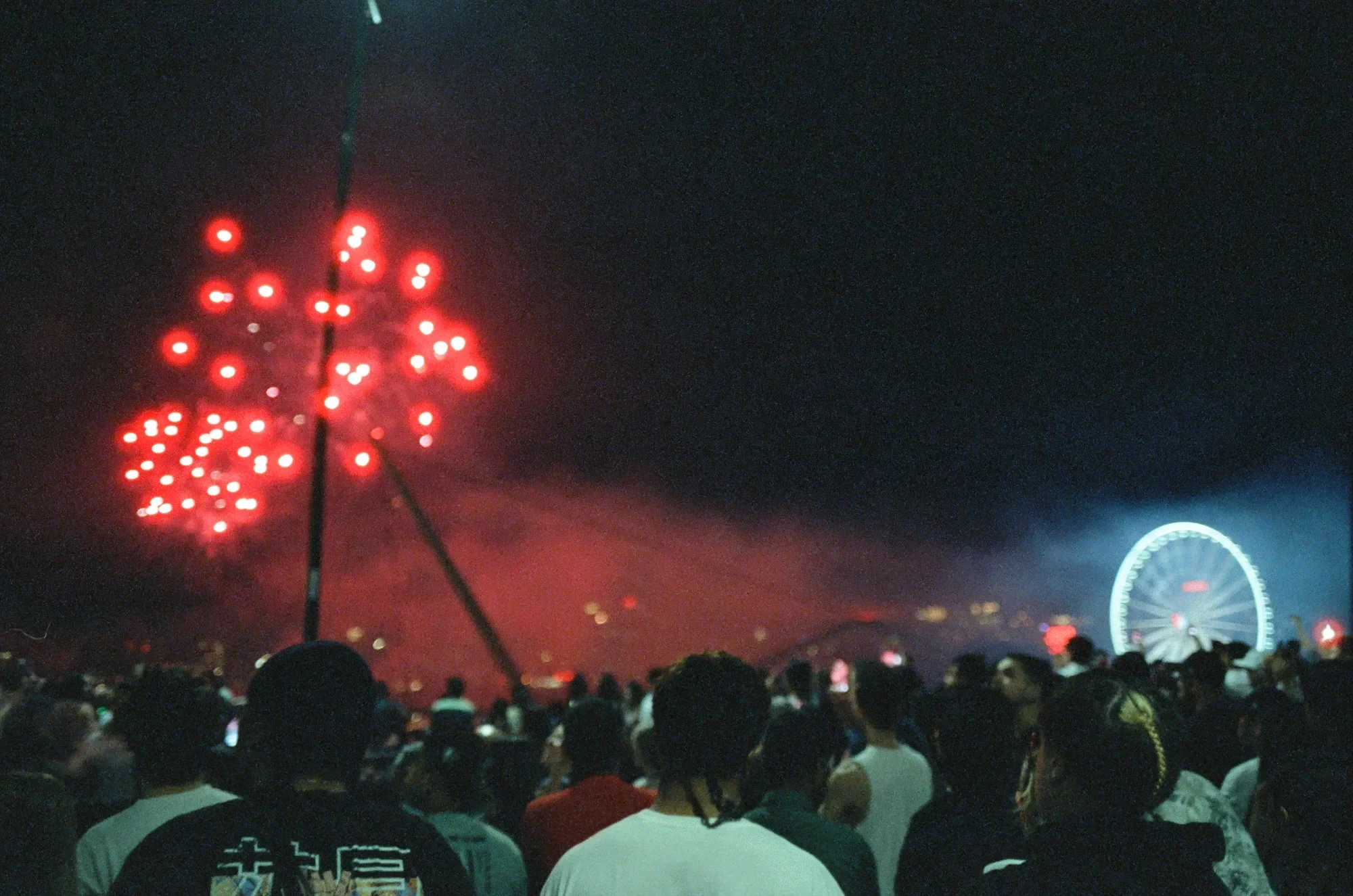 Ferris wheel lights up the night